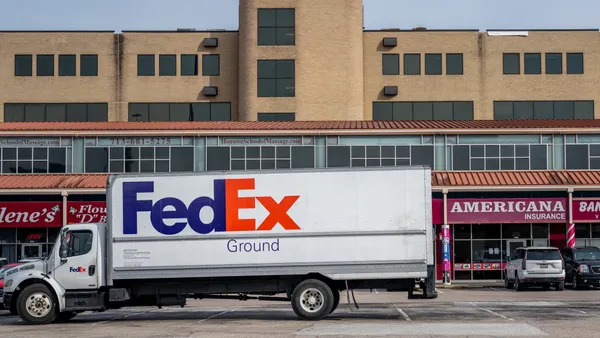 A FedEx truck parked in a parking lot near a FedEx facility on December 21, 2022 in Houston, Texas.