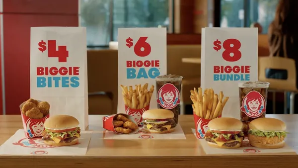 A photograph of various hamburgers and nuggets from Wendy’s.