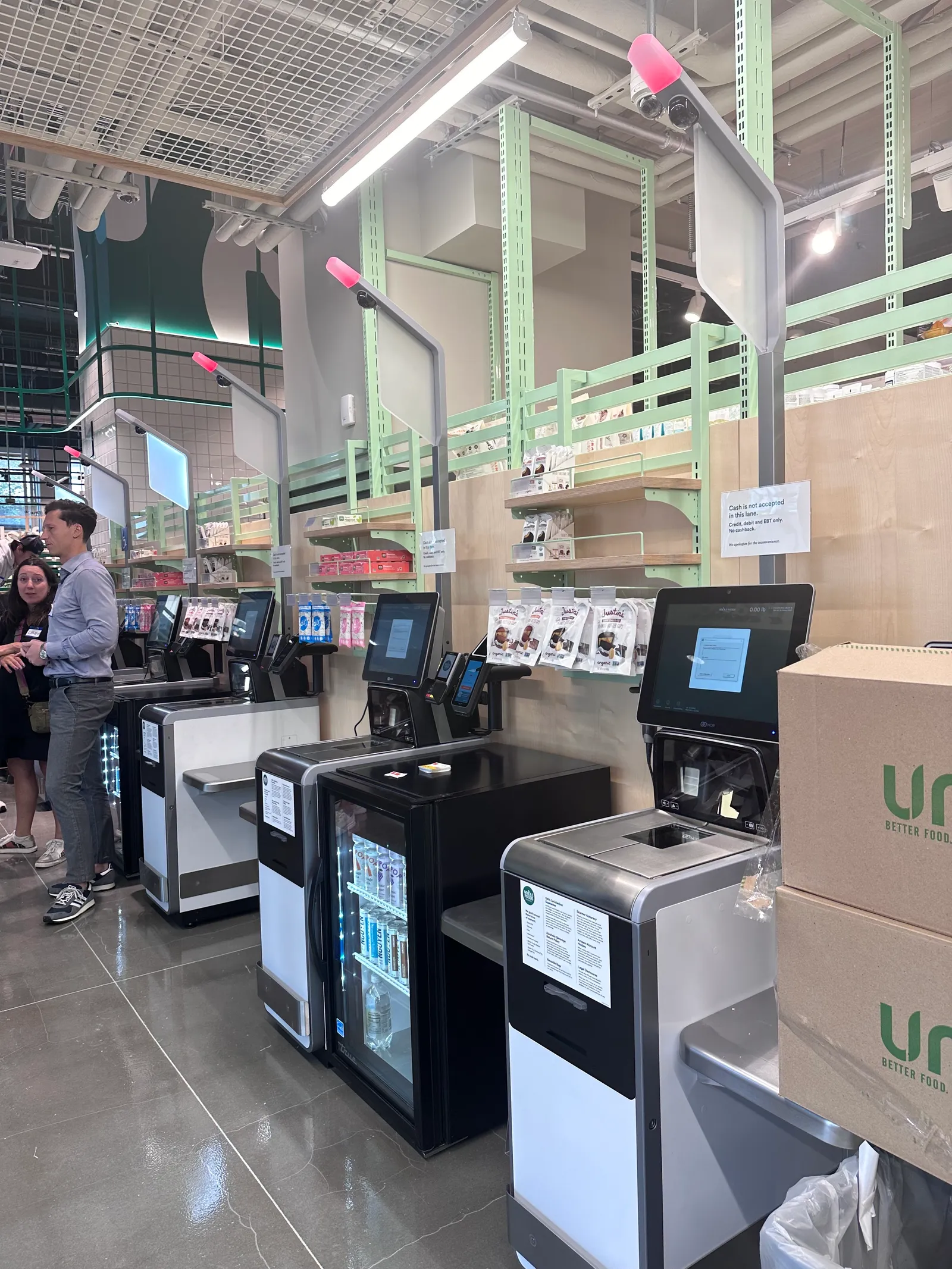 Row of self-checkout kiosks