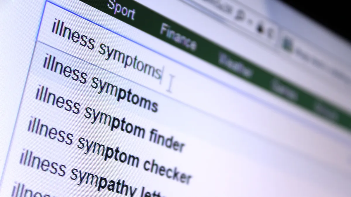 A search bar with the words "illness symptoms" and drop down results