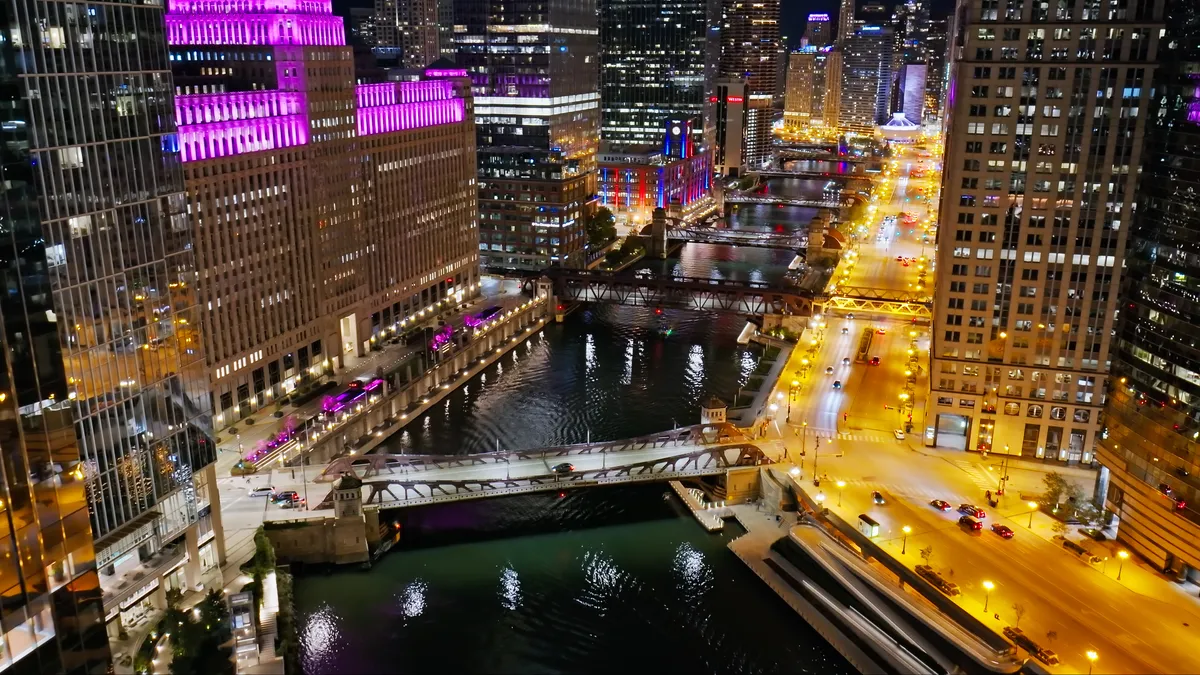 A nighttime shot of Chicago's downtown and river.