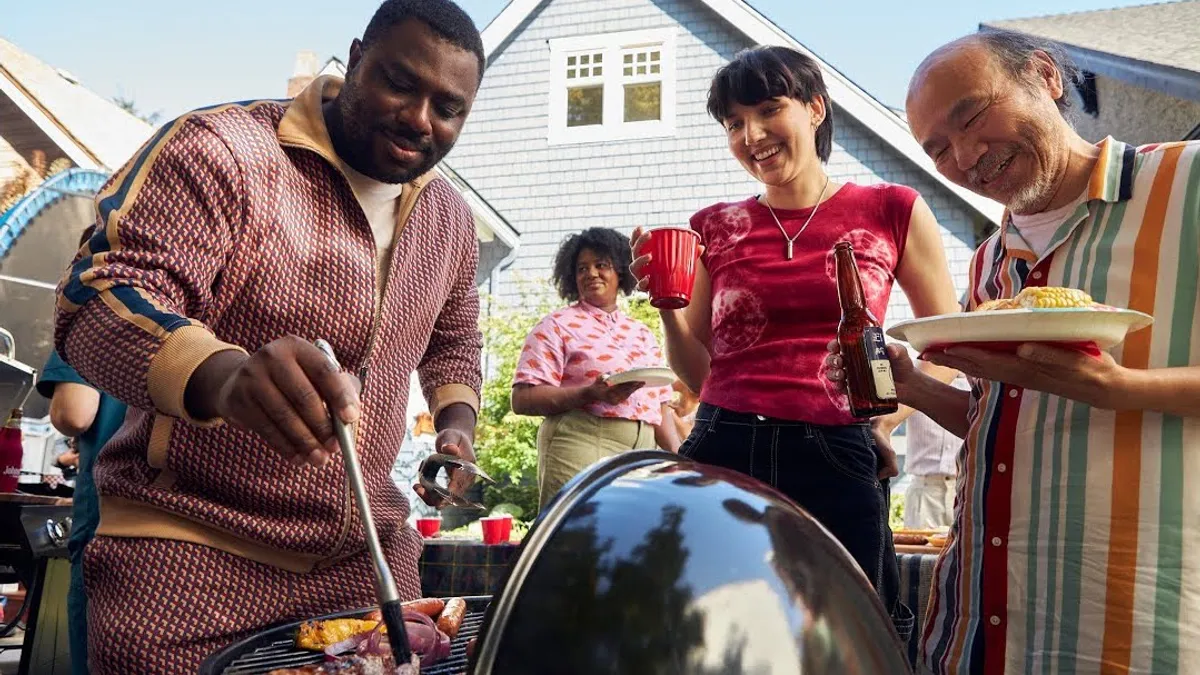 People at a cookout in a Johnsonville ad