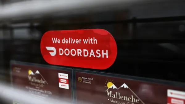 DoorDash sticker in window