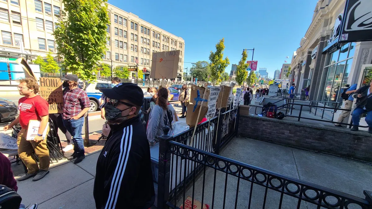 Picketers outside a Boston Starbucks during a 64 day strike.