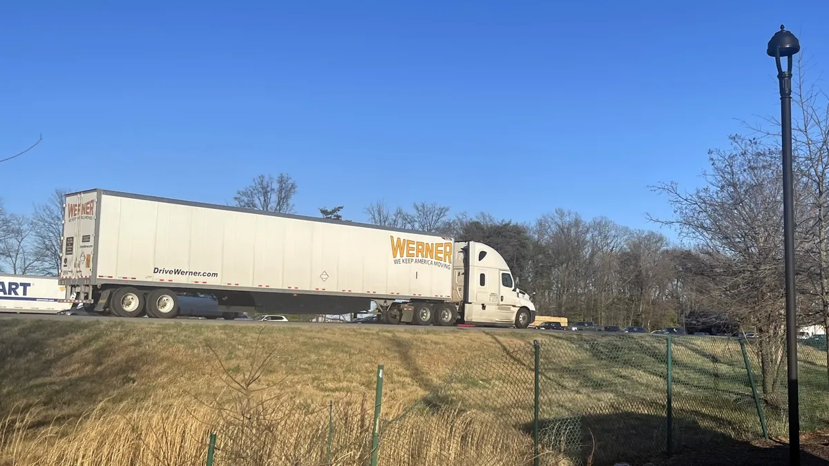 A Werner trailer is hauled on an interestate.