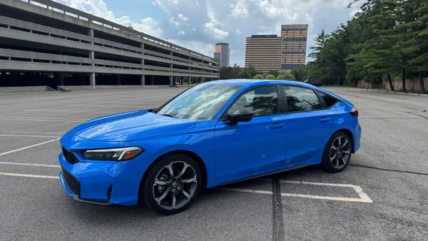 A 2025 Honda Civic Hatchback Sport Touring.