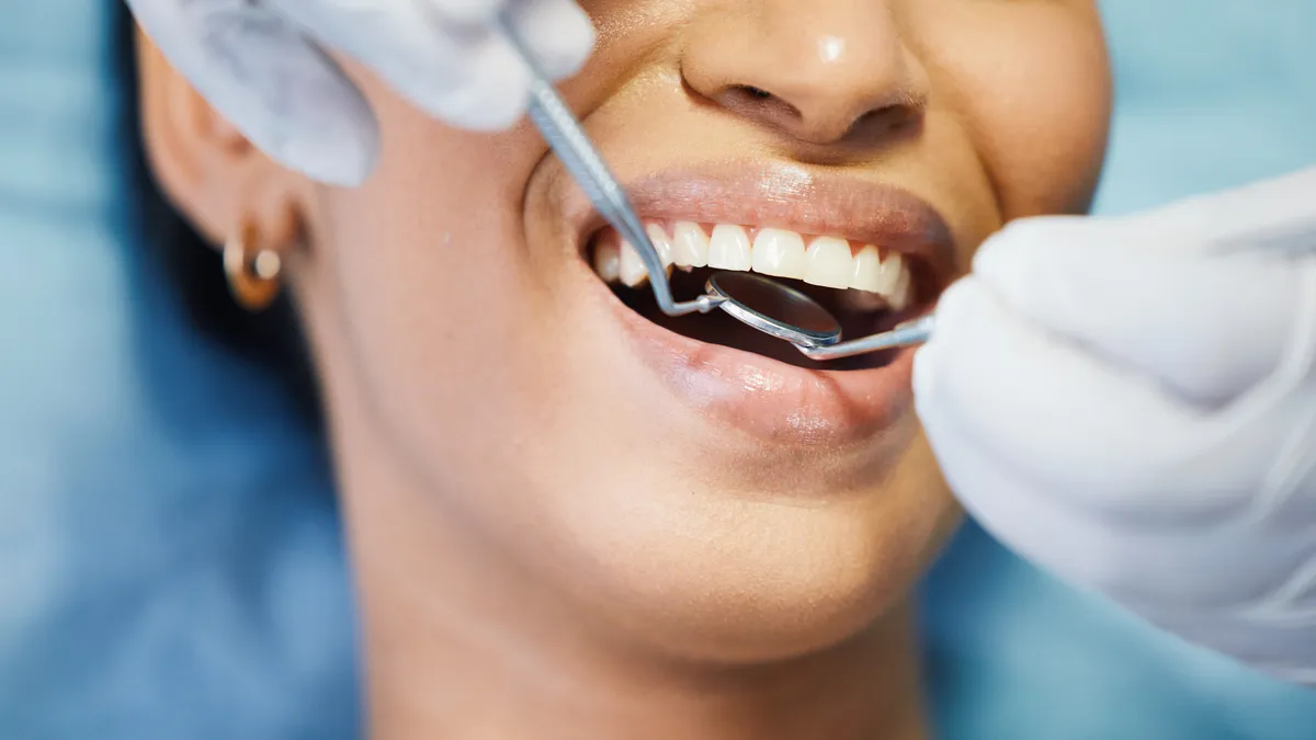 Shot of dental instruments in use on a patient