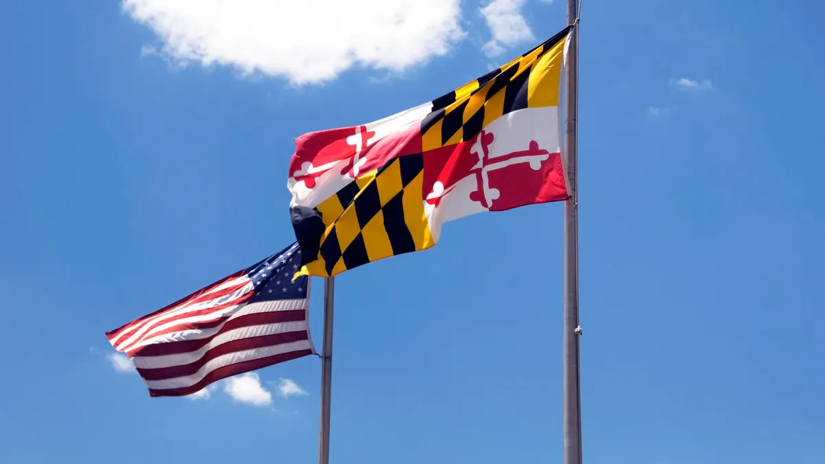 The U.S. and Maryland flags flow in the wind