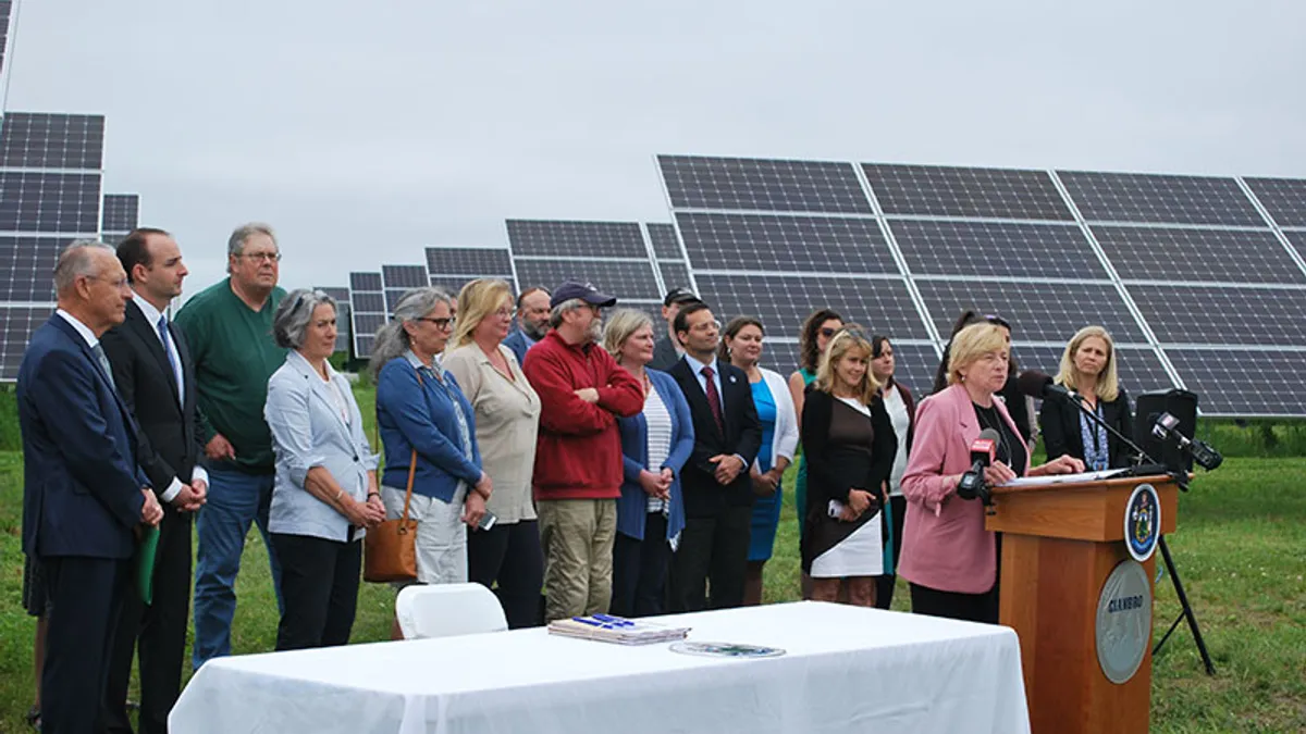 Standing in front of a solar array and joined by lawmakers and renewable energy supporters, Governor Janet Mills today signed into law three major pieces of bipartisan clean energy legislation.