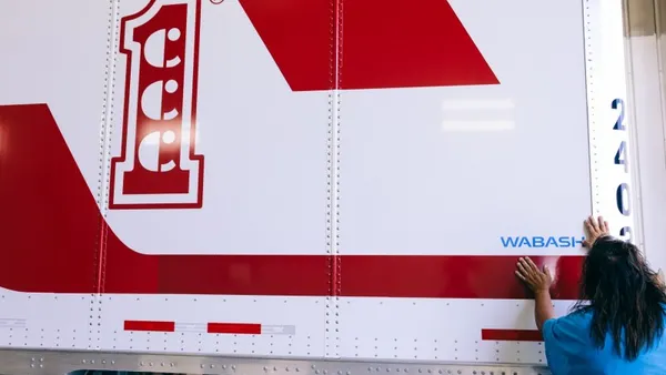 Wabash trailer worker logo