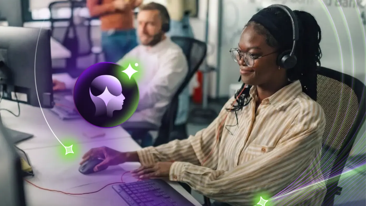Customer service representative working in busy modern office using computer and headset.