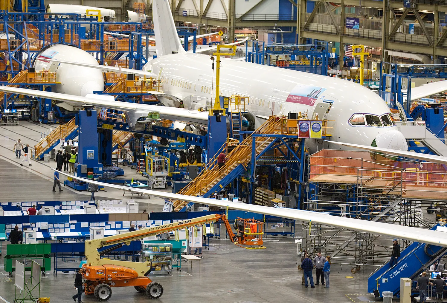 Boeing employees work on a Boeing 787 Dreamliner on one of the assembly lines February 14, 2011 at the company's factory in Everett, Washington.