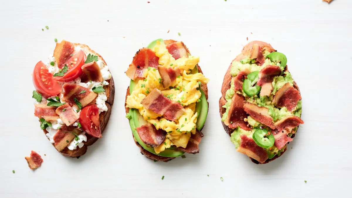 Ozo Plant-Based Bacon on top of avocado toast