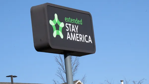 A sign for the Extended Stay America hotel brand.