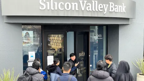 People gather outside Silicon Valley Bank.