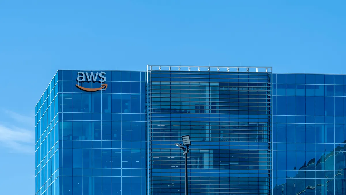 A large glass building with the AWS logo on it in Houston on April 13, 2024