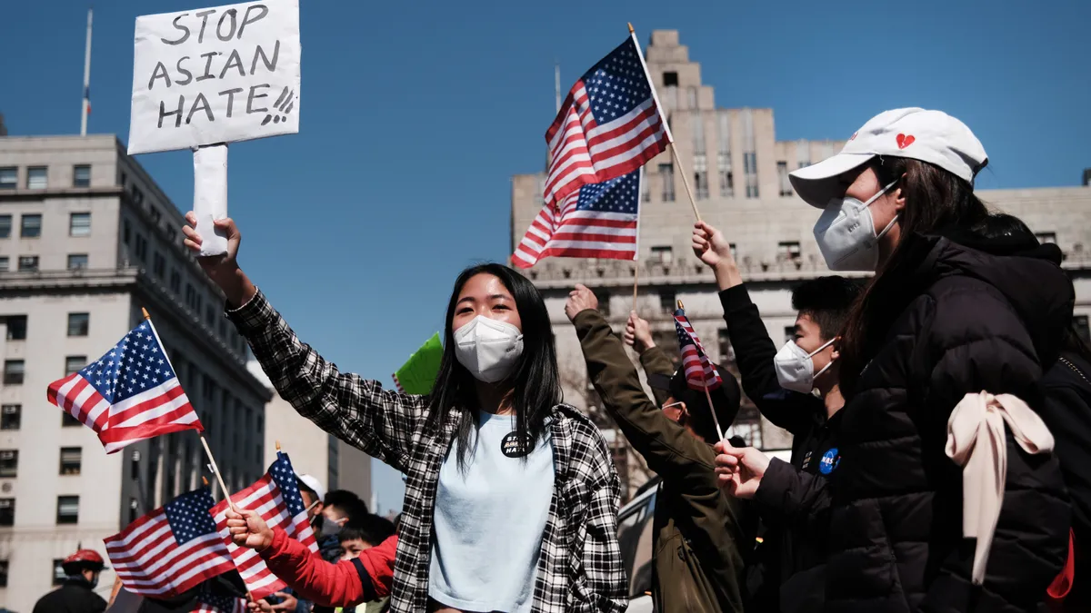 People participate in a protest to demand an end to anti-Asian violence on April 04, 2021 in New York City.