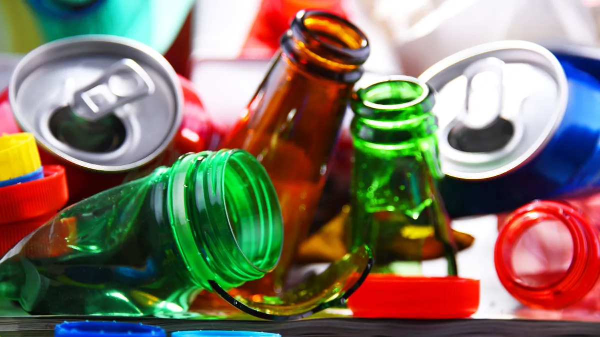 A closeup of beverage cans and bottles for recycling