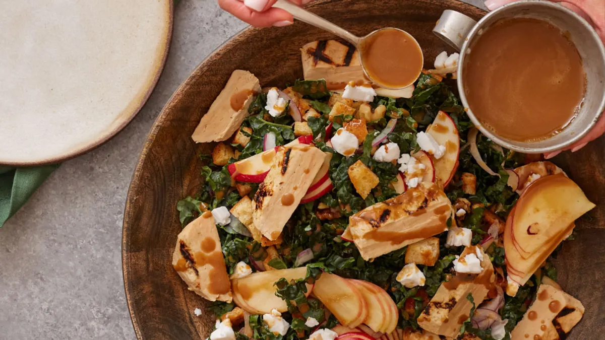 A salad with Meati's fermented chicken breast.