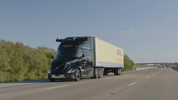 A Volvo Autonomous Truck for DHL Supply Chain on the road.