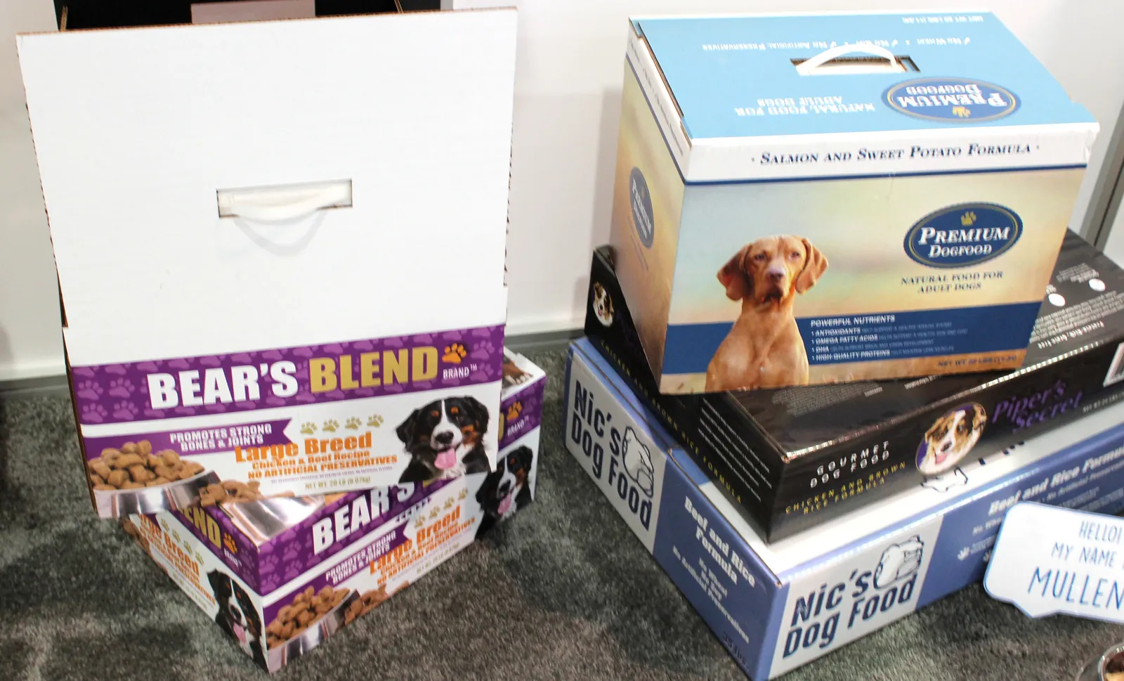 Two stacks of boxes for holding dog food.