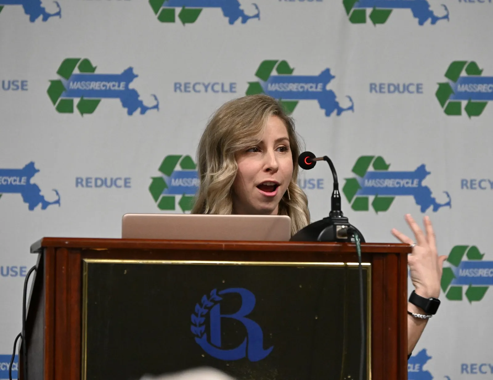 Abbey Massaro speaks at a MassRecycle event