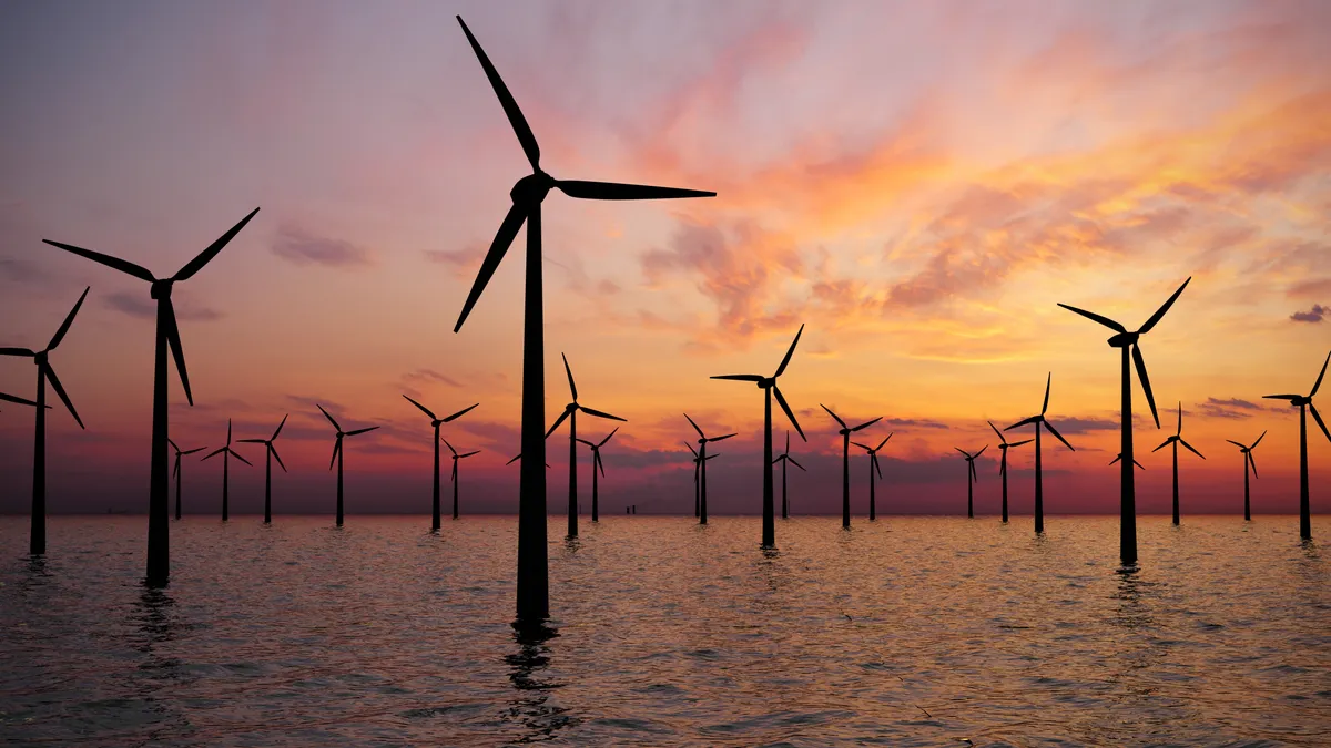 Offshore wind turbines in the ocean.