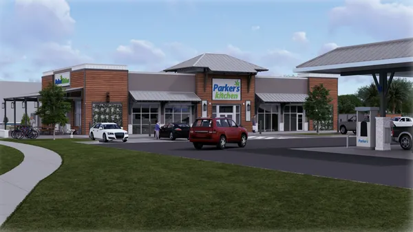 a rendering shows the exterior of a convenience store and gas station. Signs on the building say Parker's Kitchen.