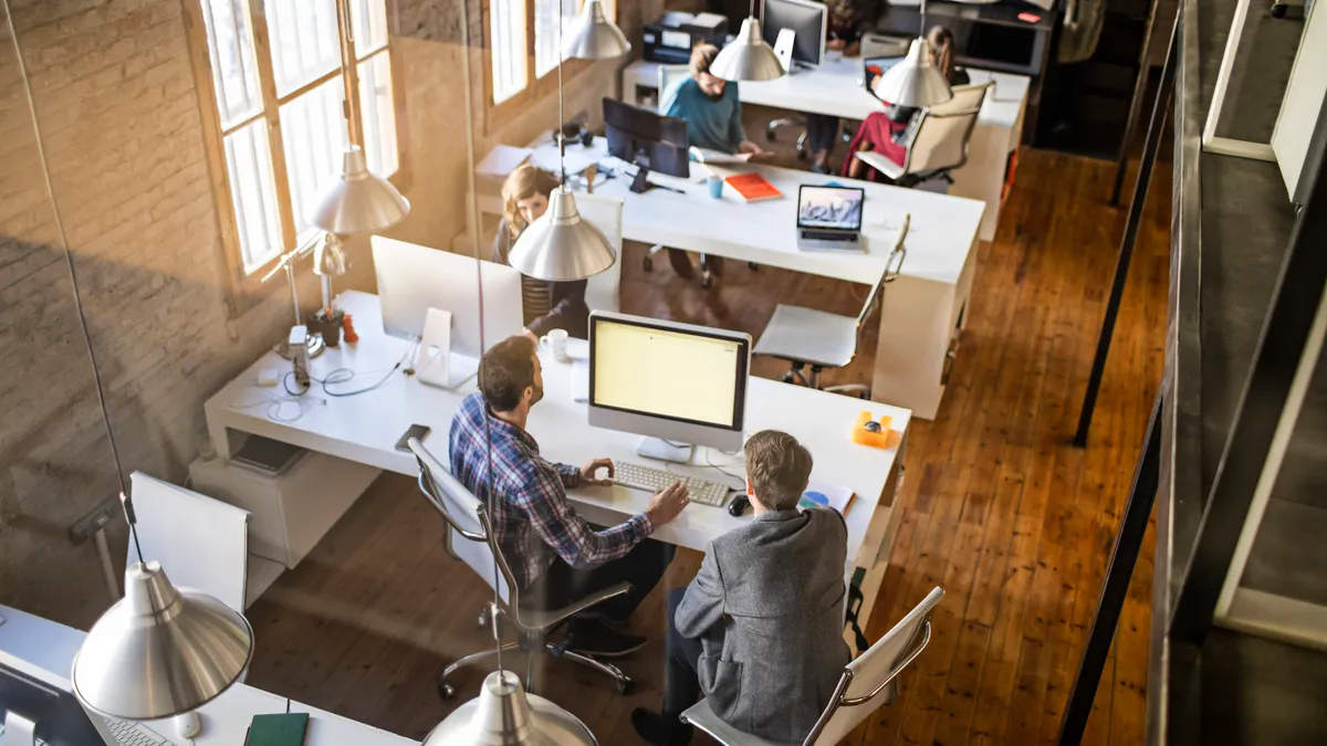 Young business people working on a startup office.