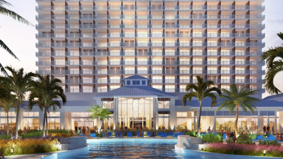 A rendering of the forthcoming Margaritaville resort in Galveston, Texas features a pool and lounge chairs.