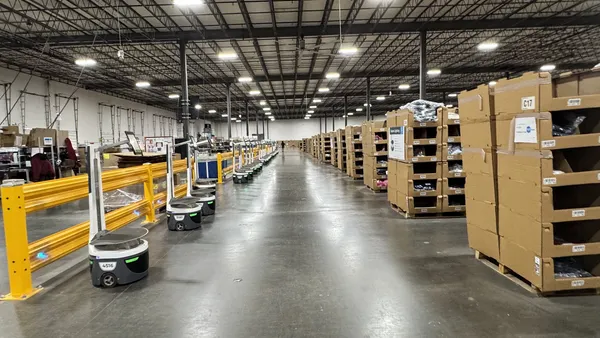 Packaging, inventory and technology seen inside a fulfillment center.