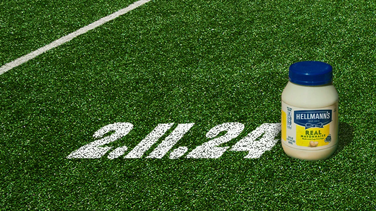 Jar of Hellmann's on football field