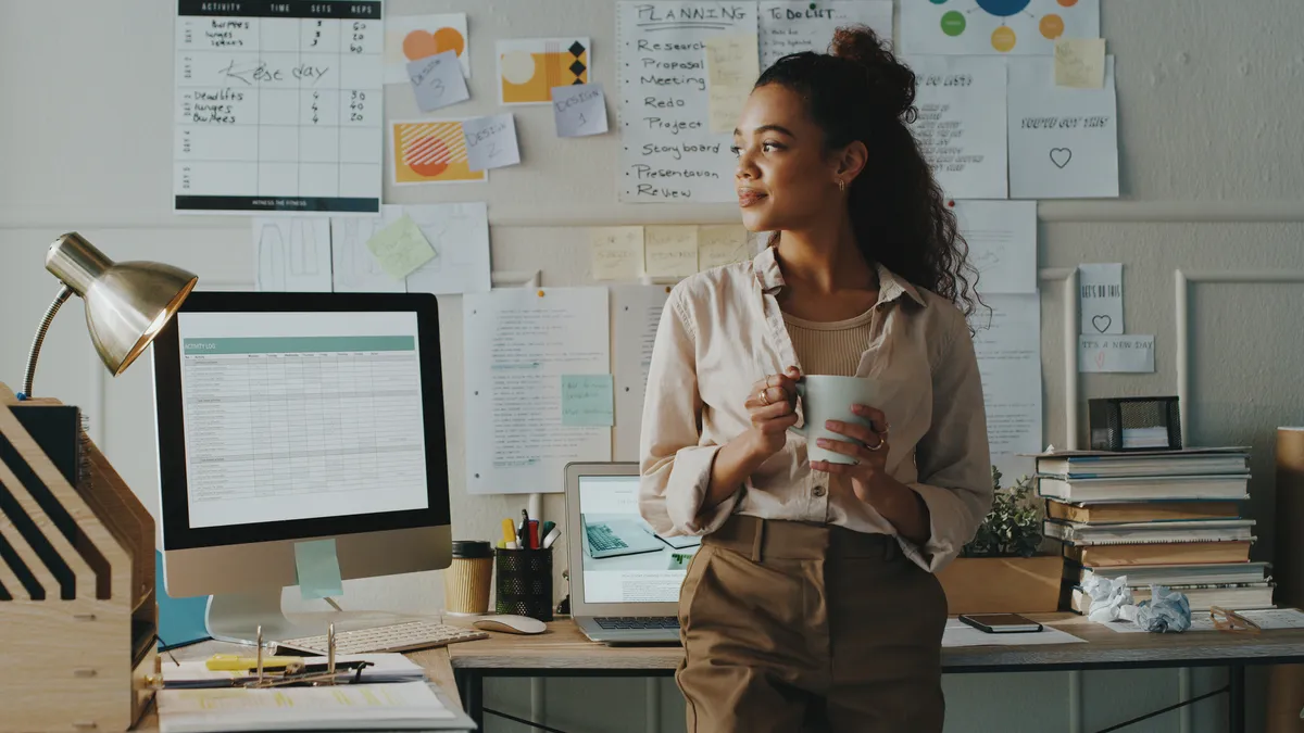 IT worker standing in home office