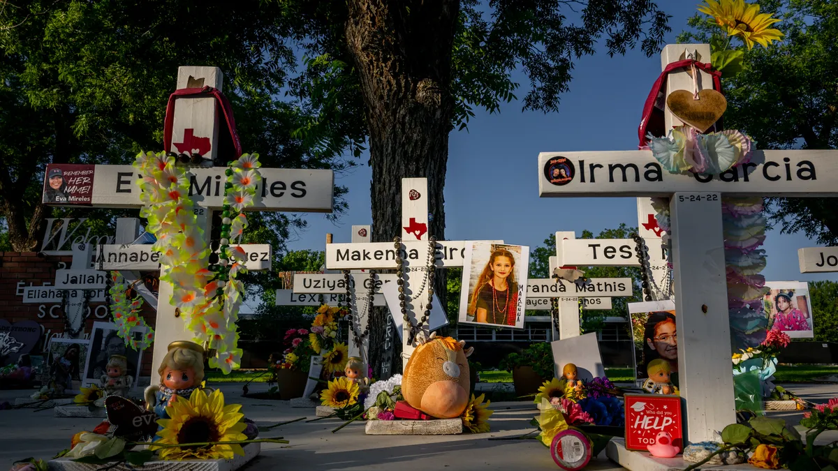 A memorial for shooting victims in Uvalde, Texas reads the names of the children killed