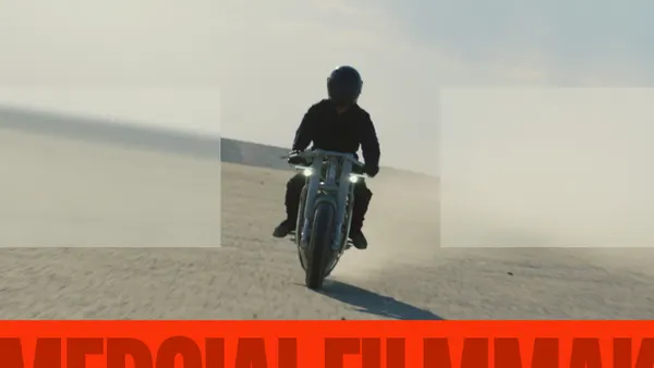 man wearing a helmet riding a bike