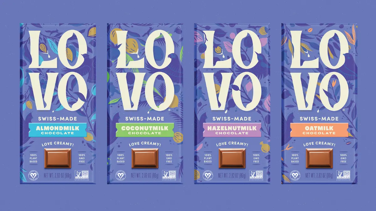 Four light purple packages of Lovo chocolate bars on a light purple background.