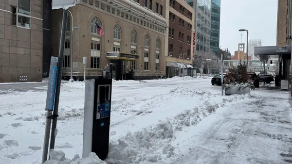 Snow coats a road in Minneapolis on March 5, 2025.