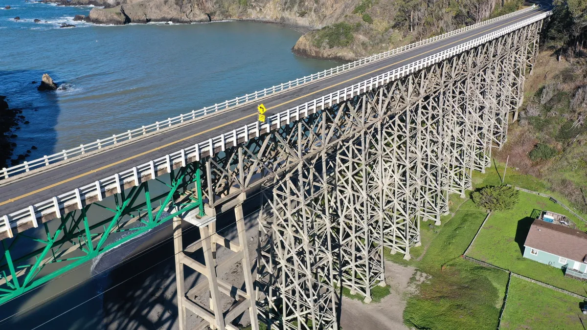 A picture of the wooden truss bridge over the Albion River in California.