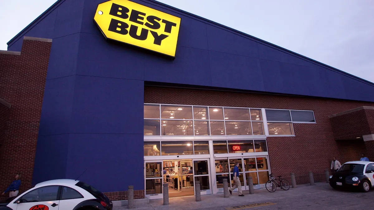 The outside of a Best Buy in its iconic blue and yellow colors.