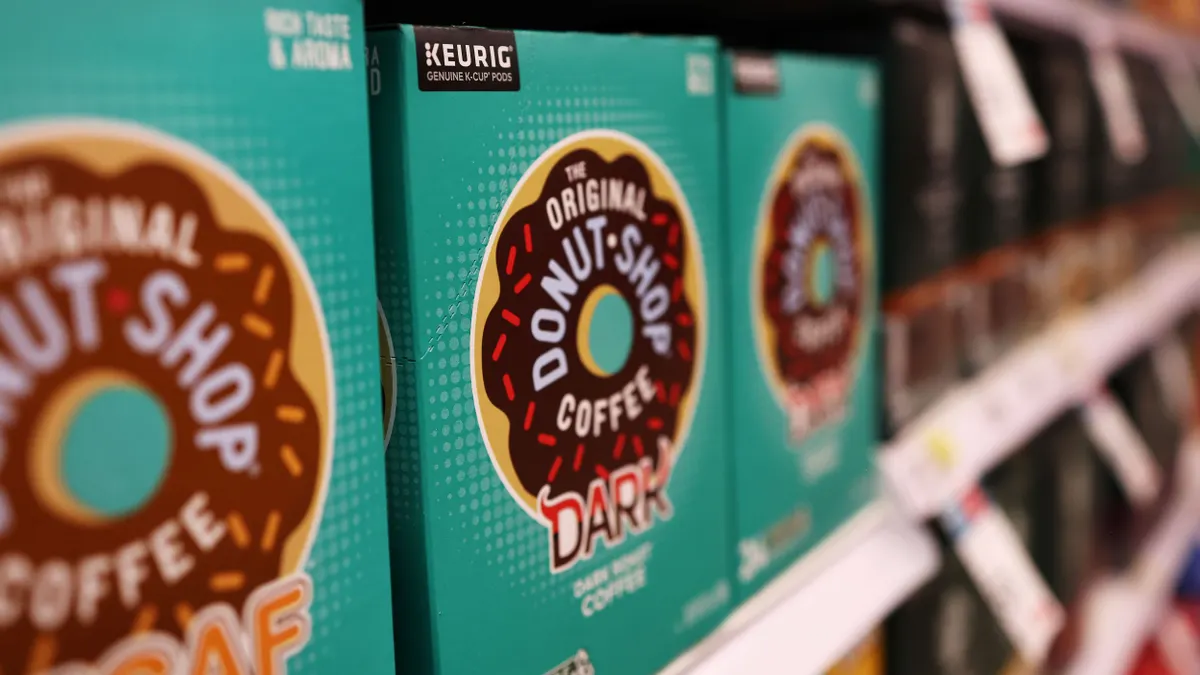 Boxes of Keurig cups on a store shelf.