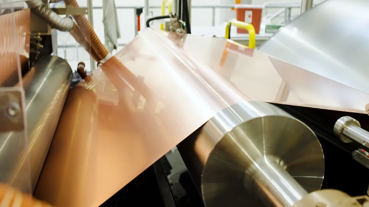 Photo of rolled foil material at a recycling plant