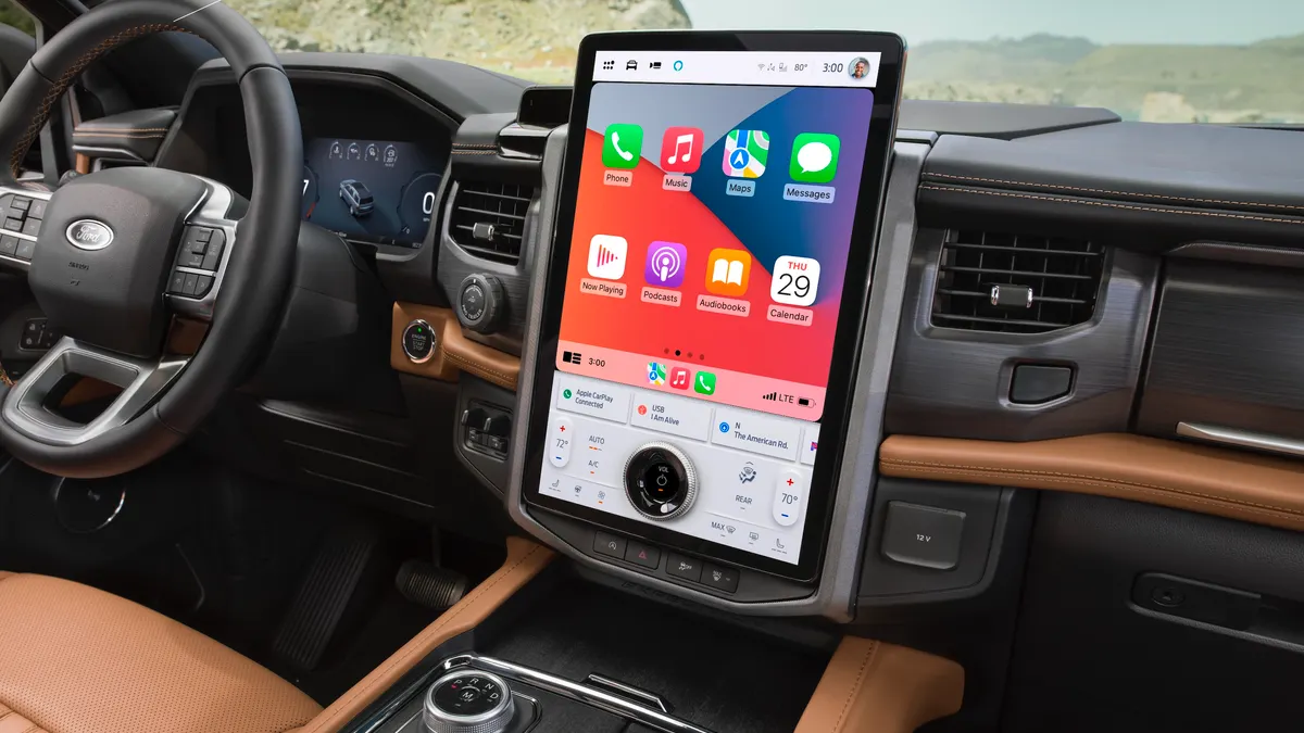 The interior of a 2024 Ford Expedition SUV showing the dashboard and center infotainment screen.