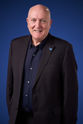 Headshot of Mark Ibbotson.