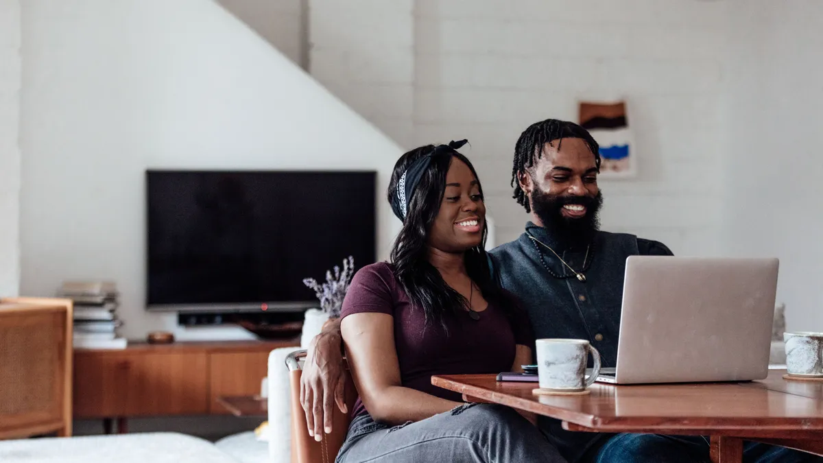 couple at home online shopping