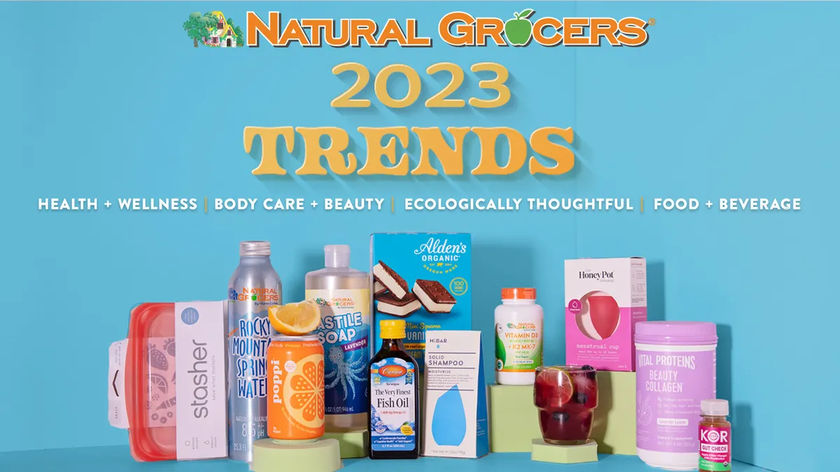 Food, beverage and health products against a blue backdrop below "Natural Grocers 2023 trends."