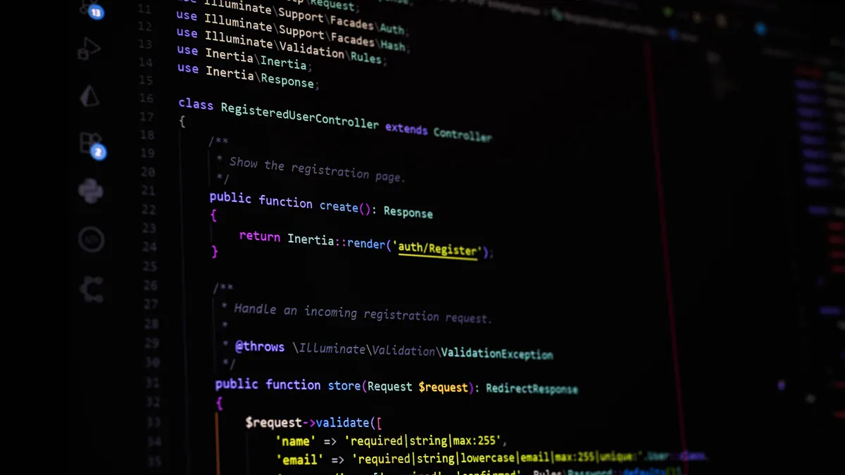 Close-up of a computer screen with Laravel PHP register controller