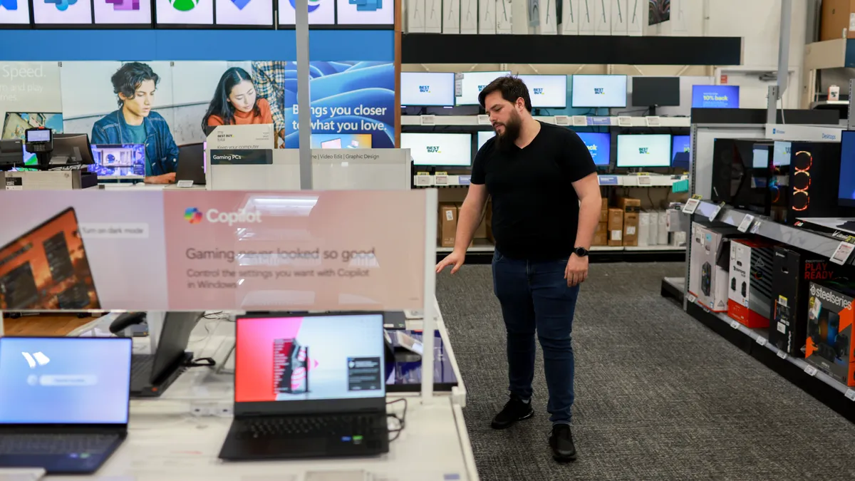 Laptops with Microsoft Copilot+ sit on display at the Best Buy store on June 18, 2024 in Miami, Florida.