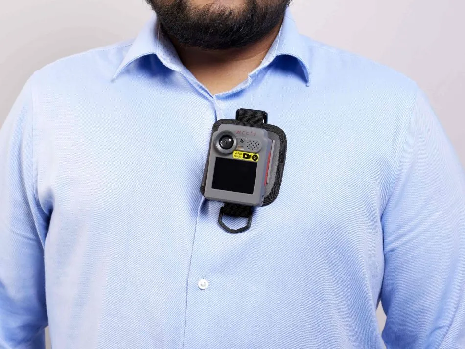 Body-worn camera clipped to shirt