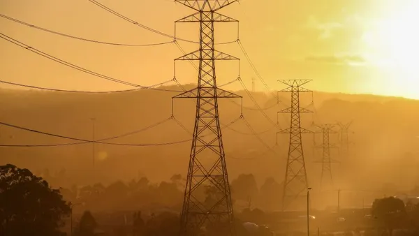 High voltage electricity transmission towers are shown at Cameron Park on May 08, 2024 in Lake Macquarie, Australia.