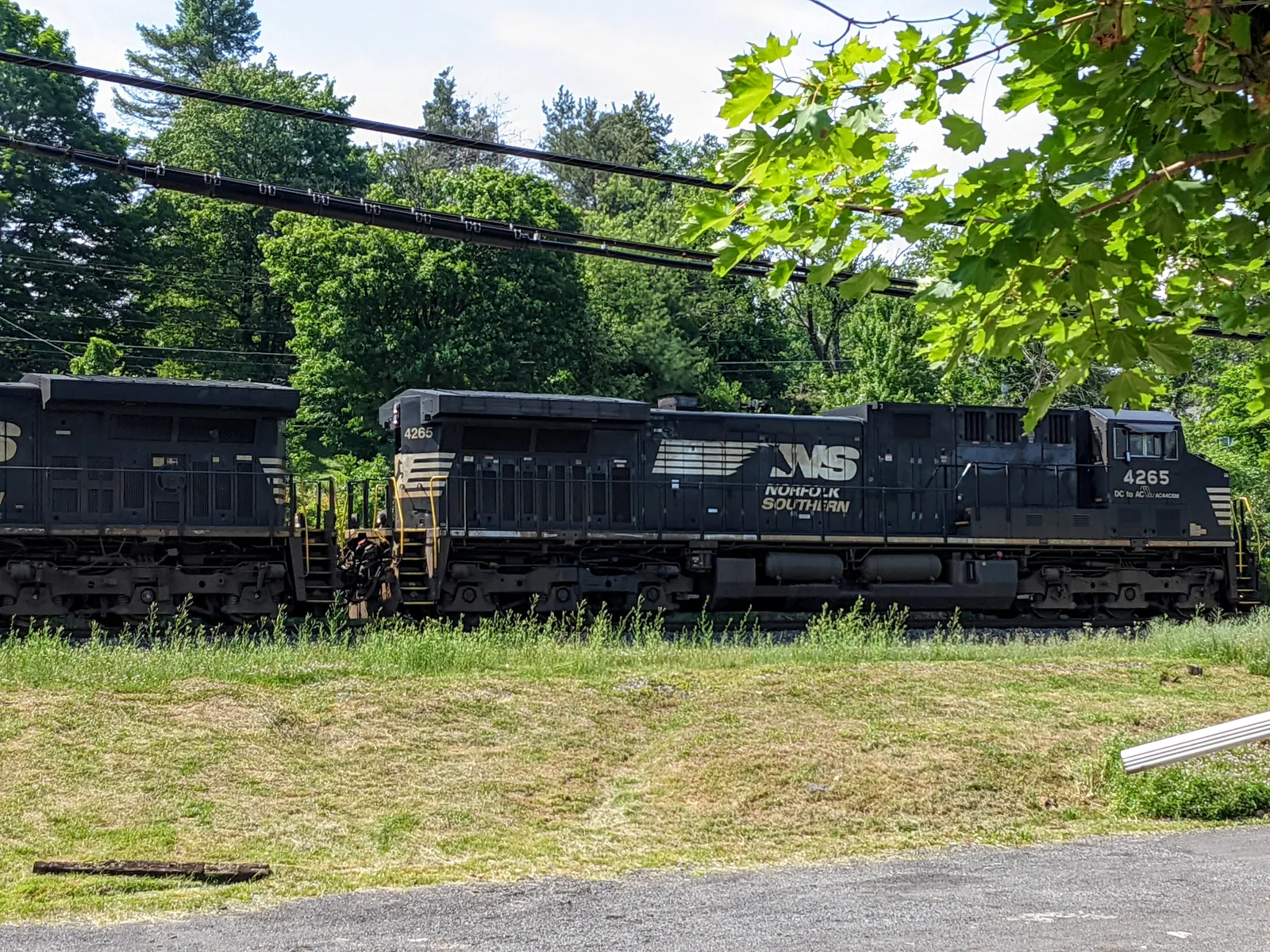 The locomotive of a Norfolk Southern train running through Cresson, Pennsylvania